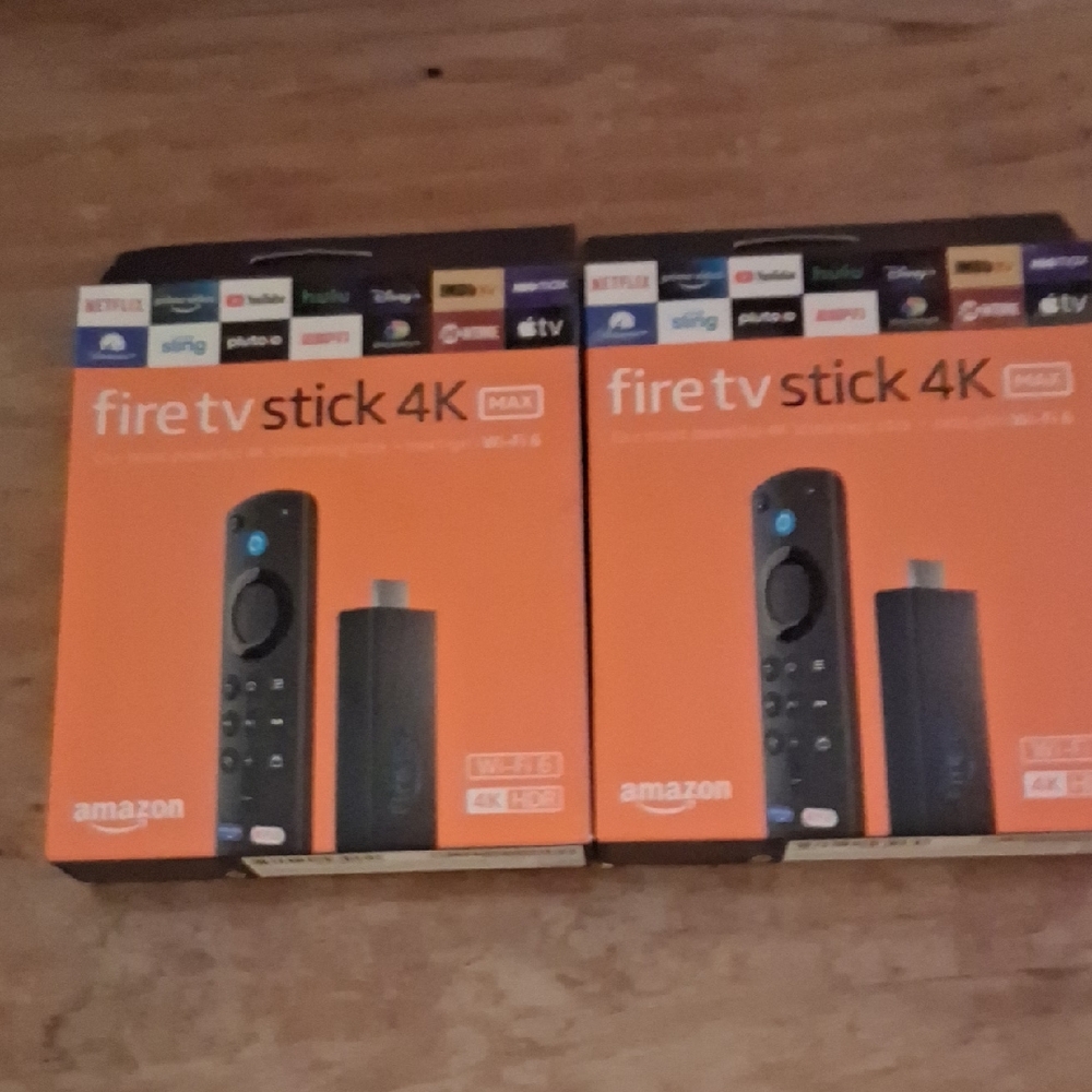 2 Amazon Fire TV Stick's 4K Max - Black and Orange
